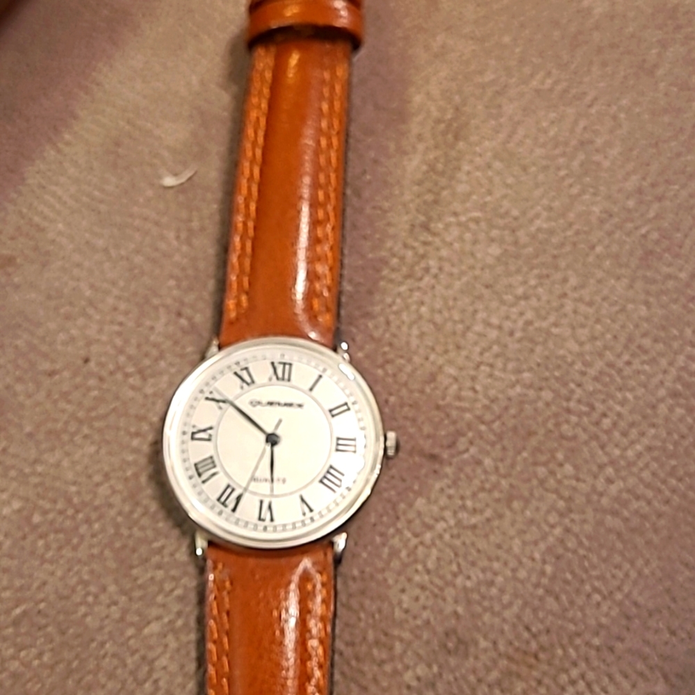 Quemex stainless steel watch with leather band